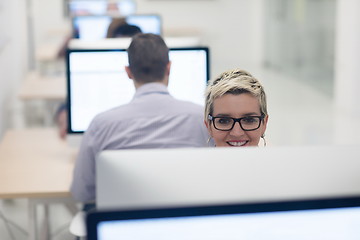 Image showing startup business, woman  working on desktop computer