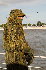 Image showing Military camouflaged solder.