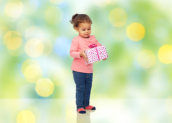 Image showing beautiful little baby girl with birthday present