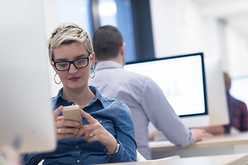 Image showing startup business, woman  working on desktop computer