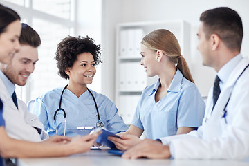 Image showing group of happy doctors meeting at hospital office