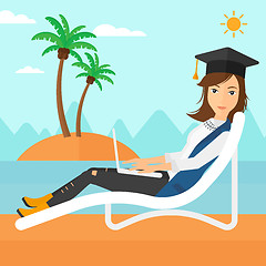 Image showing Graduate lying on chaise lounge with laptop.