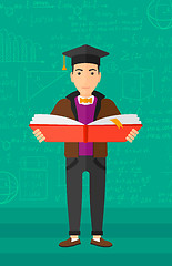 Image showing Man in graduation cap holding book.