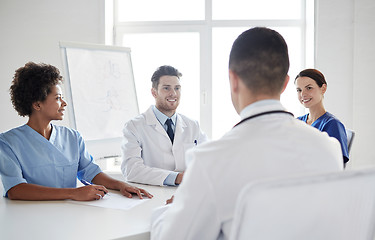 Image showing group of happy doctors meeting at hospital office