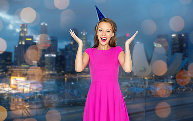 Image showing happy young woman or teen girl in party cap