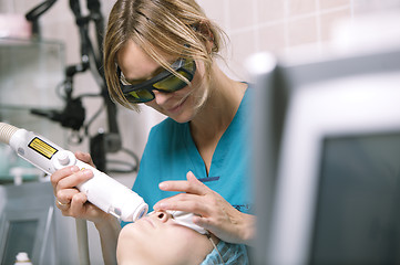 Image showing Woman having a laser skin treatment