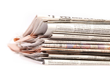 Image showing International newspapers on white.