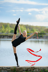 Image showing Teen Gymnast Doing Vertical Split