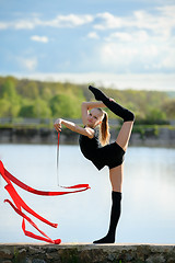 Image showing Rhythmic Gymnast in Vertical Split with Ribbon