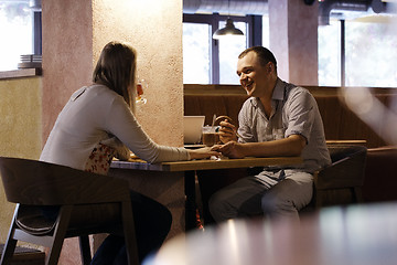 Image showing Young couple in a cafe