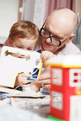 Image showing Grandpa and his grandson playing