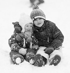 Image showing group of kids having fun and play together in fresh snow