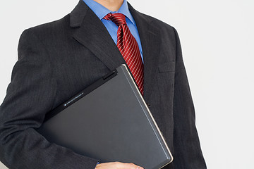 Image showing Business man with a laptop