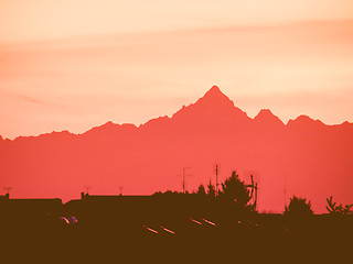 Image showing Retro looking Mountain sunset skyline