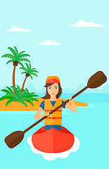 Image showing Woman riding in canoe.