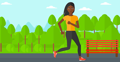 Image showing Sportive woman jogging.