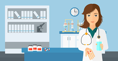 Image showing Pharmacist giving pills.