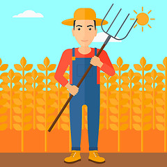 Image showing Farmer with pitchfork.