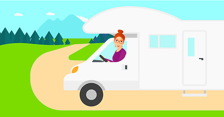 Image showing Woman driving motor home.