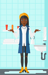 Image showing Woman in despair standing near leaking sink.