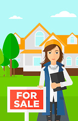 Image showing Real estate agent offering house.