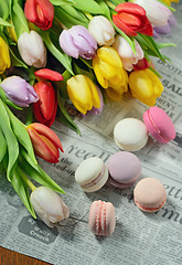 Image showing Colorful tulips and macaroons