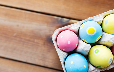 Image showing close up of colored easter eggs in egg box