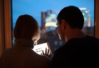 Image showing Couple Using Tablet PC in the Evening