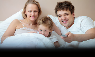 Image showing Happy family watching television