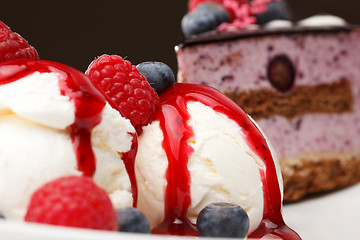 Image showing Vanilla ice cream with fresh raspberries