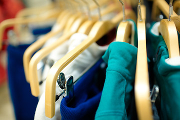 Image showing Hangers in the clothing store.