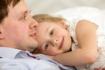 Image showing Lovely girl close to beloved father