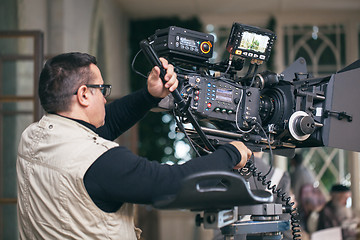 Image showing Professional camera man at work