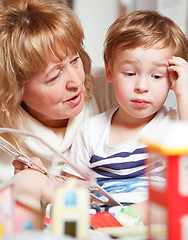 Image showing Grandma and puzzled boy