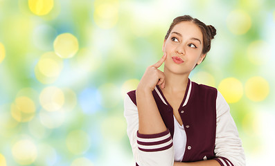 Image showing happy pretty teenage girl thinking