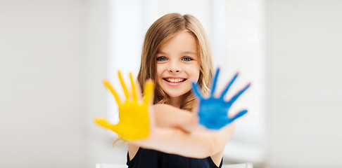 Image showing girl showing painted hands