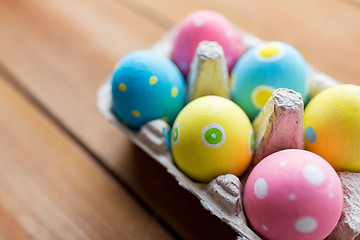 Image showing close up of colored easter eggs in egg box