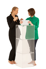 Image showing Two women looking to each other while talking