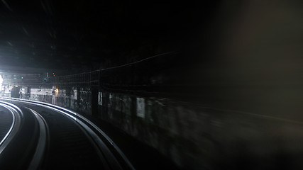 Image showing Fast subway train under blue and yellow light