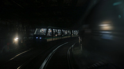 Image showing Paris train moving toward end of tunnel