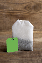 Image showing Teabag on wooden background   