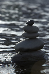 Image showing Stacked stones in water