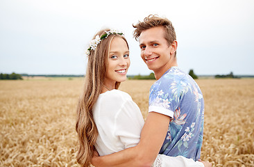 Image showing happy smiling young hippie couple outdoors