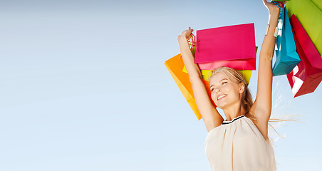 Image showing woman with shopping bags