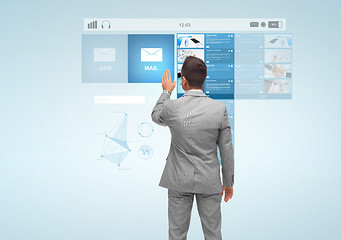 Image showing businessman with virtual projection of e-mail