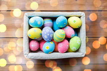 Image showing close up of colored easter eggs in basket