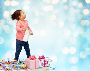 Image showing happy little baby girl with birthday presents