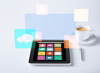 Image showing tablet pc with application icons and cup of coffee