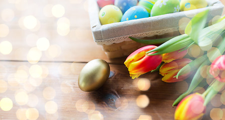 Image showing close up of colored easter eggs and flowers