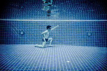 Image showing Underwater pool portraying Superman